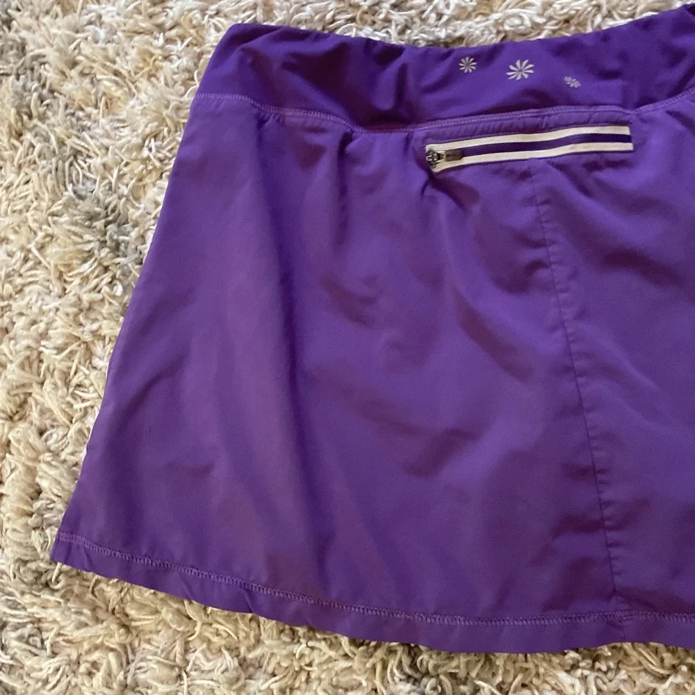 Athleta Womens Purple Pleated Active Skort Size L Tennis Running Skirt Pocket